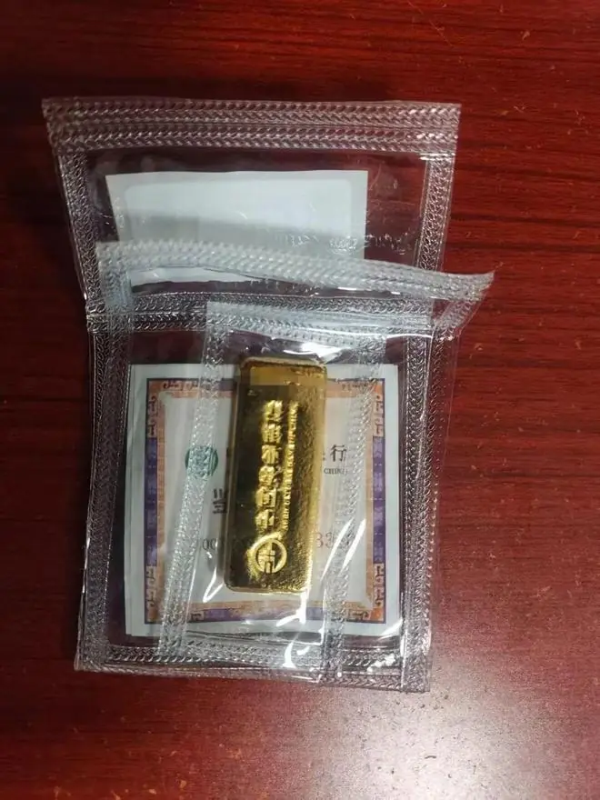 网约车司机接到“特殊订单”，乘客竟是100克金条，司机立马报警